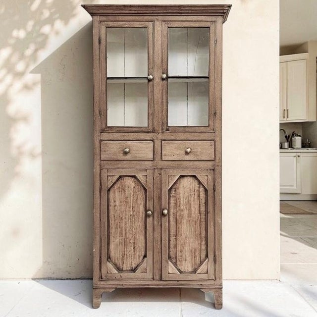 Rustic Country French character gives this charming antique vitrine a warmth that feels collected and authentic. Crafted...