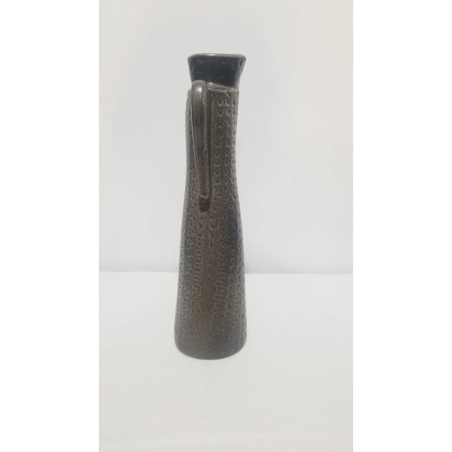 Lovely dress from vase from Lisa Larson's Wardrobe series. Produced by Gustavberg. Ceramic art piece in a muted brown...