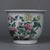 This elegant porcelain planter features a classic silhouette with a flared rim, resting upon a slightly tapered foot. The...