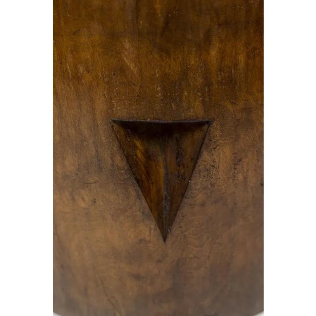 Mortar, or empty-pocket, in fruit wood and varnished, circular in shape, with its two decorative triangular shapes. Work...