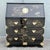 Striking vintage Chinese secretary desk featuring a glossy black lacquered finish with intricate hand-painted gilt...
