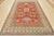 A traditional tribal Caucasian Kazak rug hand-knotted with an all-wool pile on a cotton foundation. This oriental rug...
