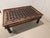 A striking example of architectural salvage furniture, this large coffee table was built around a repurposed Indian...