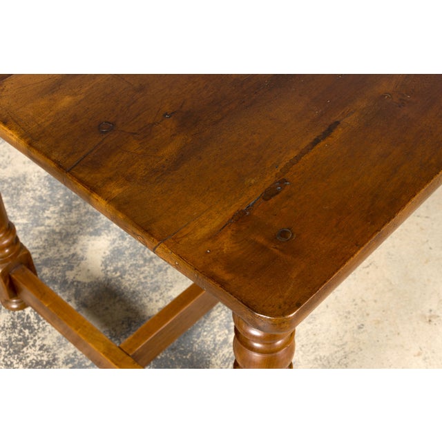 Sourced from the Périgord region of southwestern France, this mid-19th century French Provincial harvest table is crafted...