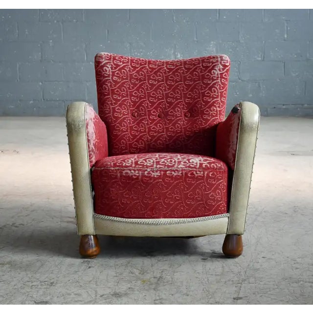 Rare Danish late Art Deco early midcentury chair from the late 1930s or early 1940s with coil springs in the backrest and...
