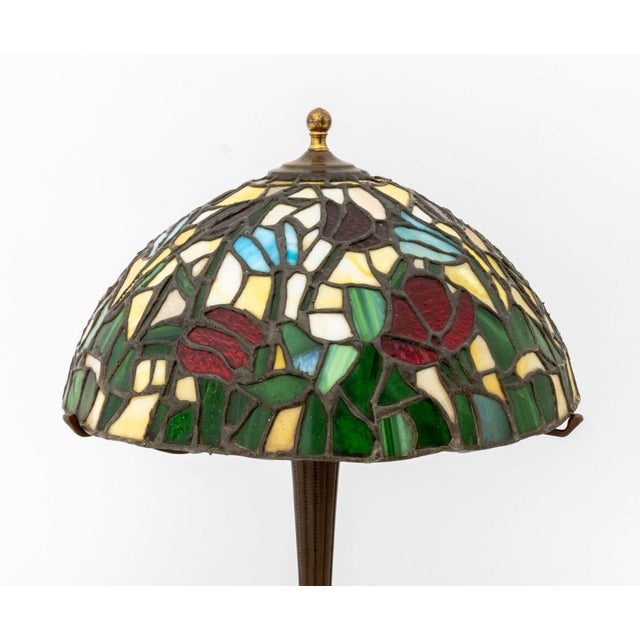 Tiffany Studios Style Stained Glass Table Lamp, bronzed patinated metal base with three bulb fittings below a tulip flower...