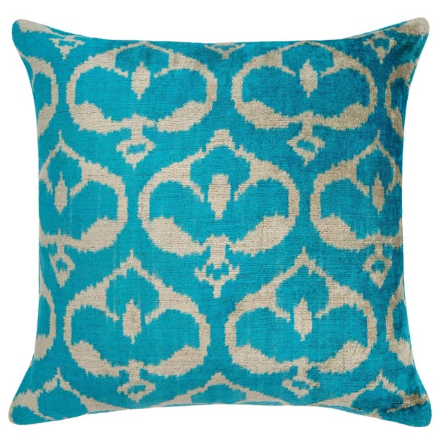 "Add a touch of elegance to your home decor with this handmade velvet throw pillow, featuring a stunning turquoise and...