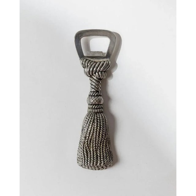 This refined vintage bottle opener from 1970s France is a silver-plated design by Silea, crafted in the elegant shape of a...