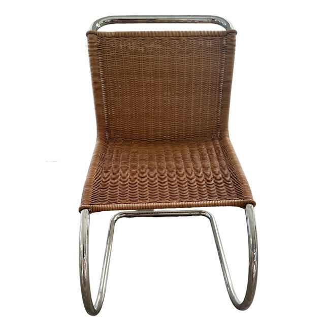 This is a set of Mies van der Rohe MR 10 cantilevered rattan side chairs. Set of 8 and in perfect condition. Two years new...