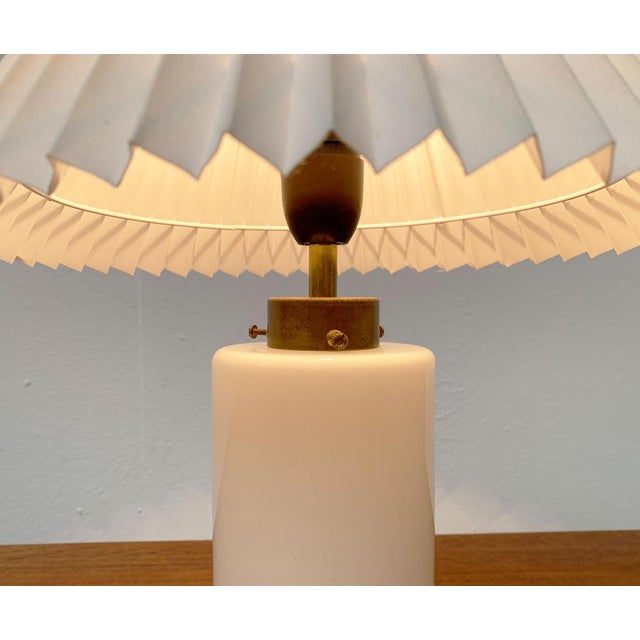Mid-Century Glass Table Lamp from Odreco, 1960s, in Very Good conditions. Designed 1960 to 1969 This piece has an...