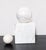 Presented is a Mid-Century Marble Square solid pedestal base with two sizes of Round Marble spheres. The larger sphere has...