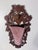 A beautifully hand-carved antique Black Forest-style wall pocket dating to the early 20th century. Crafted from richly...