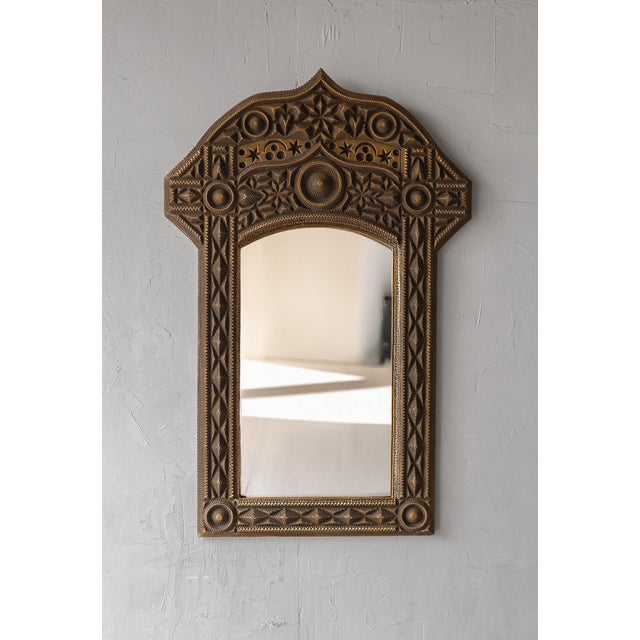 This mirror is a stunning example of Tramp Art style. Tramp art is a folk art style known for its meticulous hand-carved...