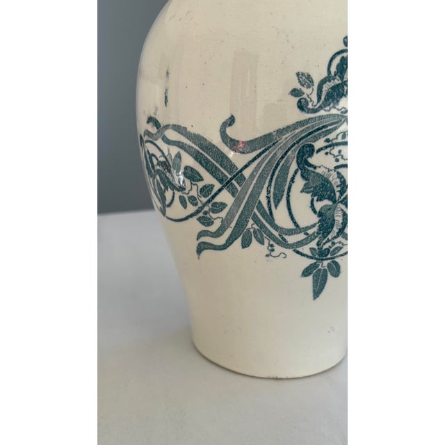 Superb antique ironstone pitcher from the renowned Creil and Montereau factory, part of the Louise pattern wash set. This...