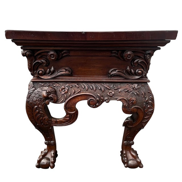 A fine and rare Irish George II mahogany console table circa 1750. The table with a rectangular top over an elaborately...