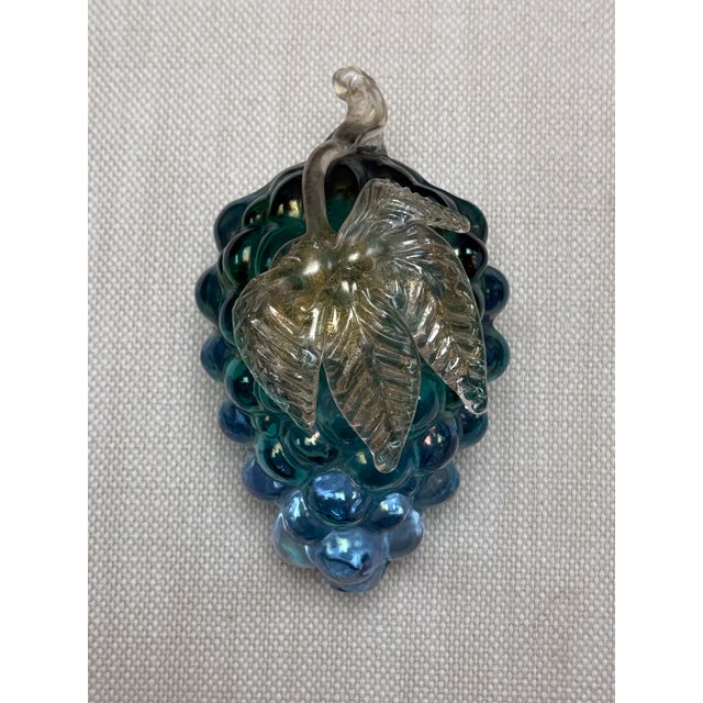 Design Plus Gallery presents an Iridescent Blue Glass Bunch of Grapes in the Kugel Style. These grapes are hand-blown with...