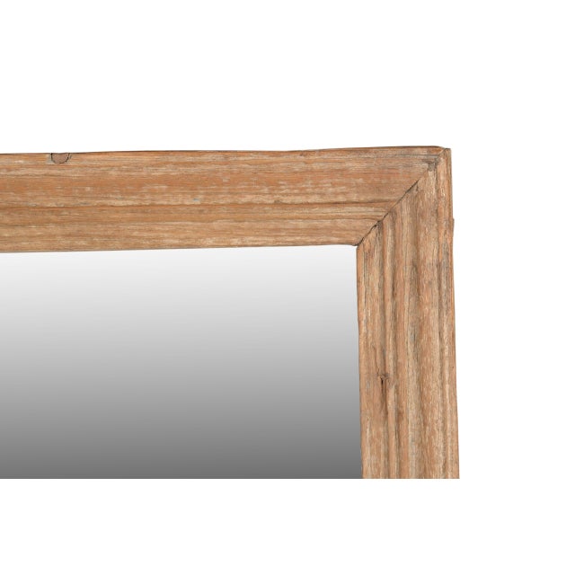 Vintage Indian Teakwood Mirror, in a light teak finish with wide molding, perfect size for any room. This piece will...