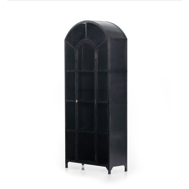 Elegant and practical, Display books, barware and other treasures in an arched cabinet with a glass pane detailed door....