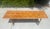Gorgeous vintage console table by luxury furniture maker, McGuire of San Francisco. Featuring over 6’ of boho style with a...