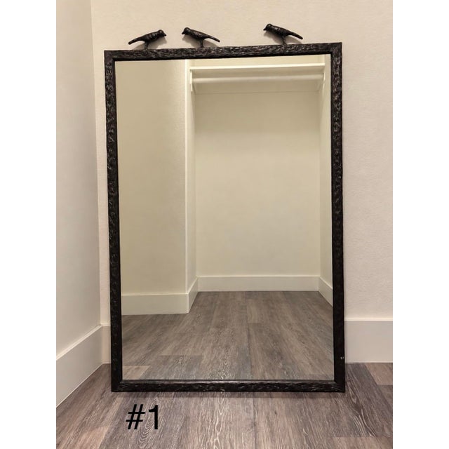 Stunning matching pair of Made Goods Joelle Three Birds Mirrors in Oiled Bronze. Crafted from metal and glass/mirror, each...