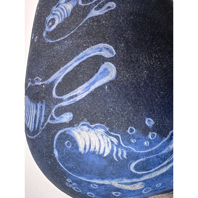 This high-quality mid-century studio ceramic vase was created by an unknown artist. The piece is signed with the ceramist'...