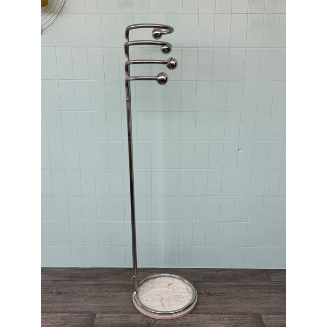 Sculptural coat hanger Italian manufacture from the 70s in Space Age style Chromed steel structure with plastic spheres...