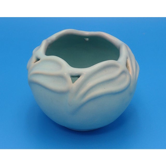 Van Briggle Art Pottery Vase with Pierced Rim in Matte Turquoise Blue Description: This sculptural Van Briggle vase...