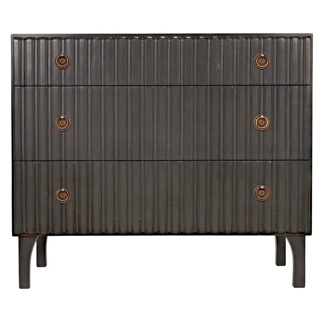 This unique solid mahogany dresser is distinguished by the textural carving on the faces of its three drawers. The unique...