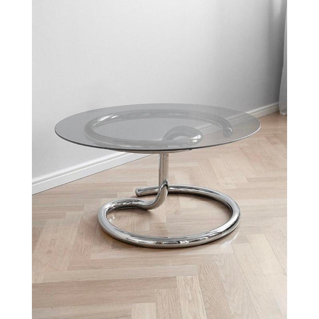 The Anaconda coffee table model by the legendary Paul Tuttle embodies the futurism and space-age design of the 1970s....