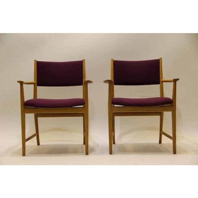 Armchair, designed by Kai Lyngfeldt Larsen. Produced by Søren Villadsen Denmark. Ash tree and original fabric. Price for...