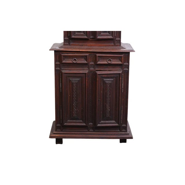 This rare 19th-century Italian walnut buffet de corps features a classic raised panel door style in a rich brown color....