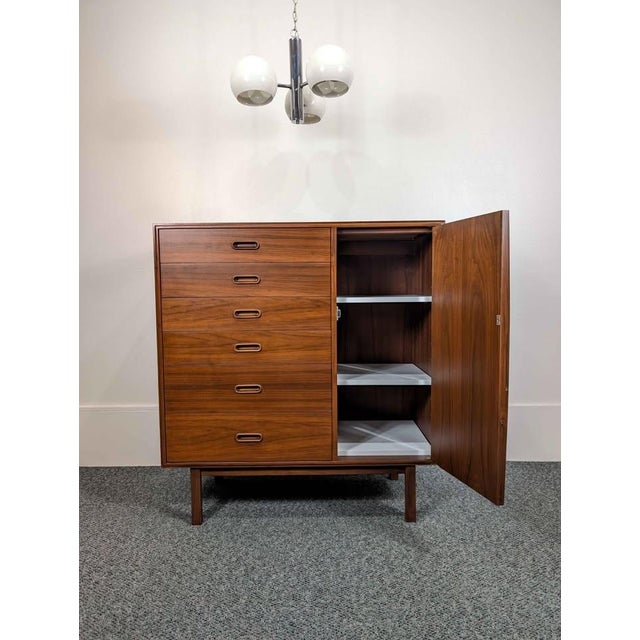 Stunning mid century modern gentlemen's chest by iconic designer Jack Cartwright for Founders. This breathtaking piece has...