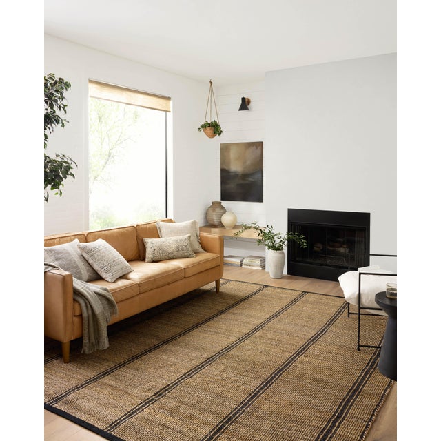 The Colton Collection by Angela Rose x Loloi is a new take on the staple jute rug, blended with cotton for added softness....