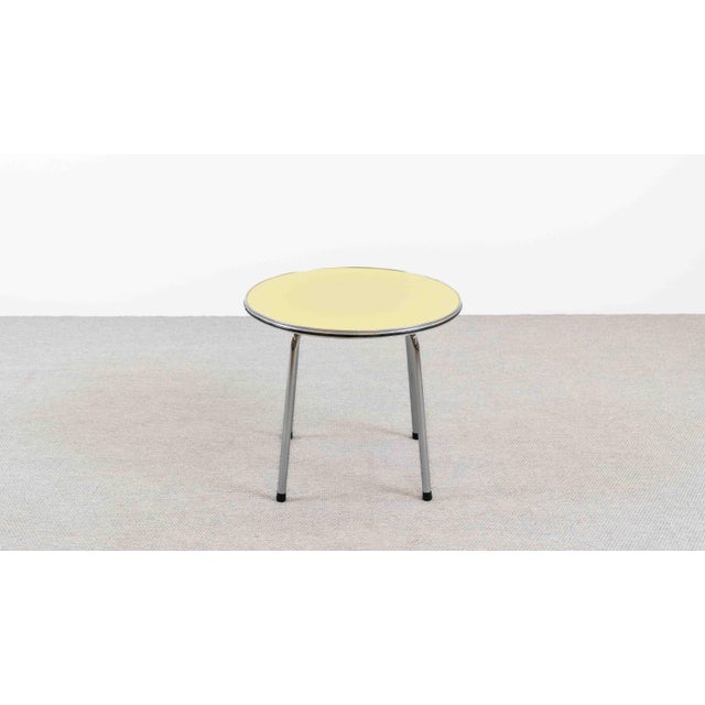 Vintage tubular steel table in Bauhaus style, circa 1950s. Elegant vintage side table made of chrome-plated tubular steel...