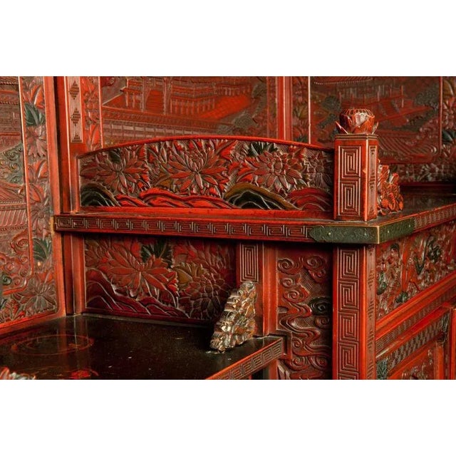 This incredible example of Asian lacquer carving stands head and shoulders above nearly any piece it could be compared to,...