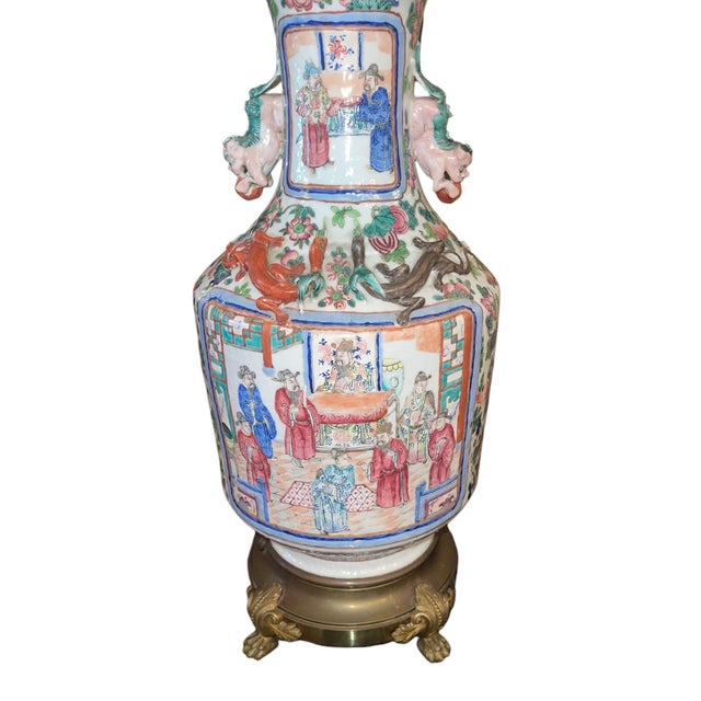 A striking late-19th-century Chinese Canton famille rose porcelain vase, later mounted as a substantial table lamp with...