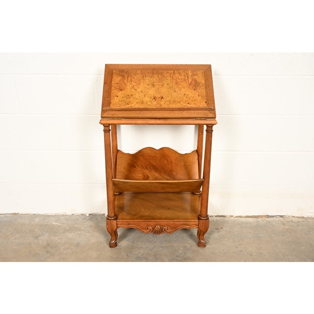 An exceptional French Provincial Louis XV style walnut and burl wood book stand, magazine stand, or side table By Baker...