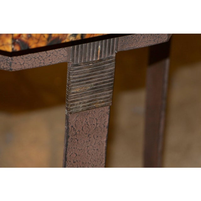 A beautiful coconut shell table with two labels underneath, Kreiss collection and Maitland-Smith. It features an a...