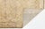 Elevate your interior with this exceptional vintage hand-knotted wool area rug, featuring a sophisticated palette of muted...