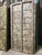 Elevate your space with the timeless beauty of this antique carved teak wood door, a stunning architectural piece rich...