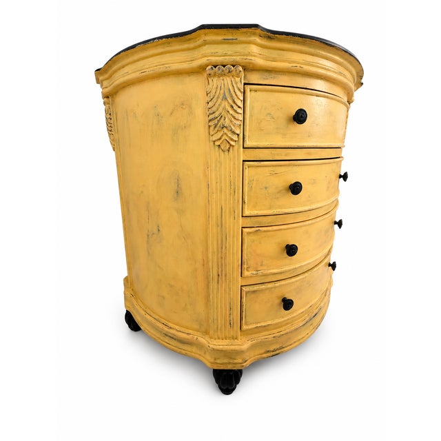 French Provincial serpentine dresser. Hand-painted in a warm vintage yellow with a soft distressed finish, this piece...
