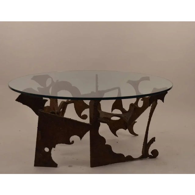 Torch cut iron base, with original plate glass top (.5"). Unusual to find signed and dated examples ( Seandel '75)....