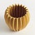 With a rounded form, deep ribbing and thickly applied glaze, this natureinspired pot is a work of art. The handfinished...