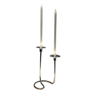 Design/One silver metal candlestick For Sale