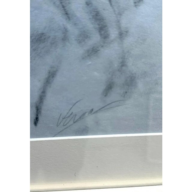 This evocative Vintage Boho Sketch captures the raw and dynamic essence of the male form. The artist's deft use of...