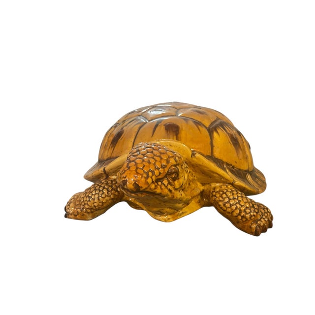 Monumental ceramic tortoise sculpture measuring an impressive 47 inches in length — a rare and eye-catching decorative...