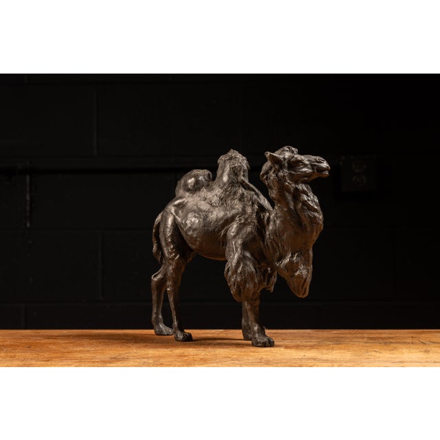 Early 20th century bronze camel okimono, (置物) (lit. ornament for display) This piece depicts what appears to be a bull...