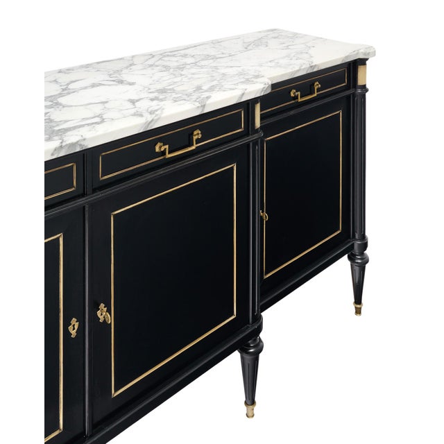 French buffet or enfilade in the Louis XVI style. This piece is made of solid wood construction, primarily mahogany. It...