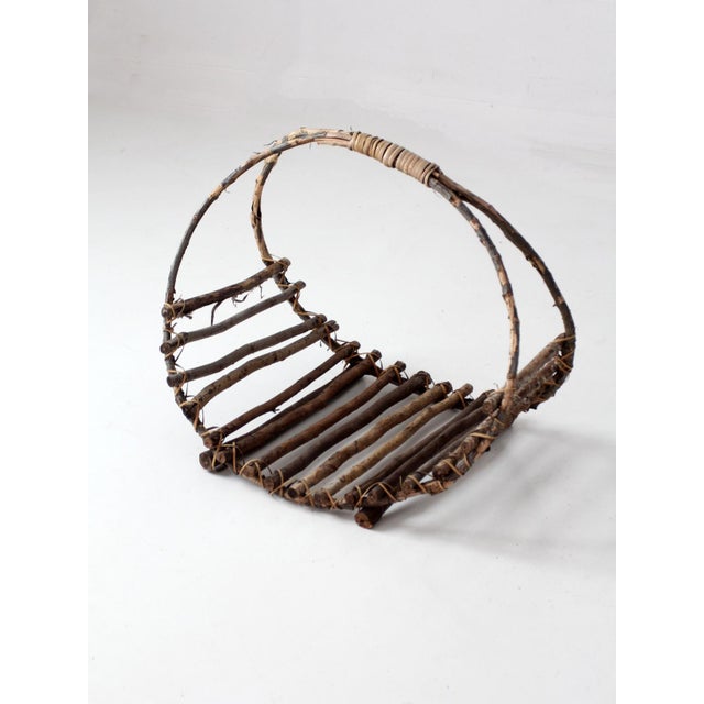 Vintage Rustic Twig Basket With Arched Handle For Sale - Image 9 of 18
