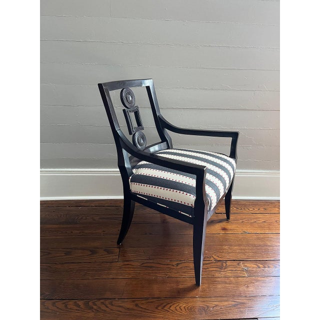 A stunning pair of "Vienna" ebonized armchairs from the Laura Kirar Collection for Baker Furniture. These chairs are for...